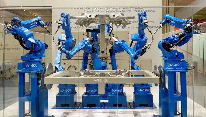 One cell with 7 Yaskawa welding robots.